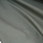 پارچه مانتو شلواری پلی استر ویسکوز بروجرد عرض 150 طرح ساده رنگ  زیتونی