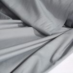 پارچه لباسی پلی استر ویسکوز عرض 150 بروجرد طرح ساده رنگ طوسی کد 0060